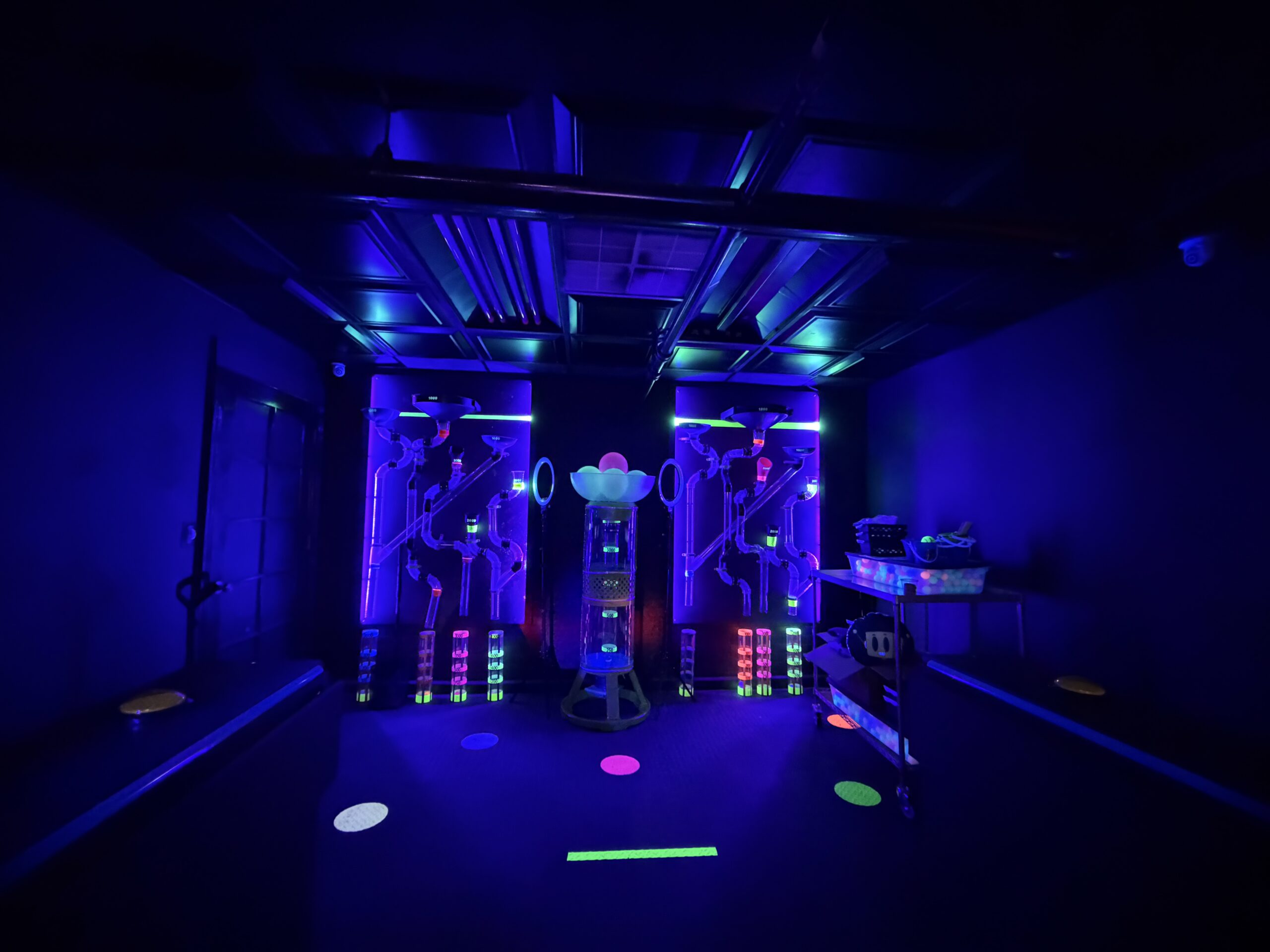 The neon-lit Great Escape Game Show studio